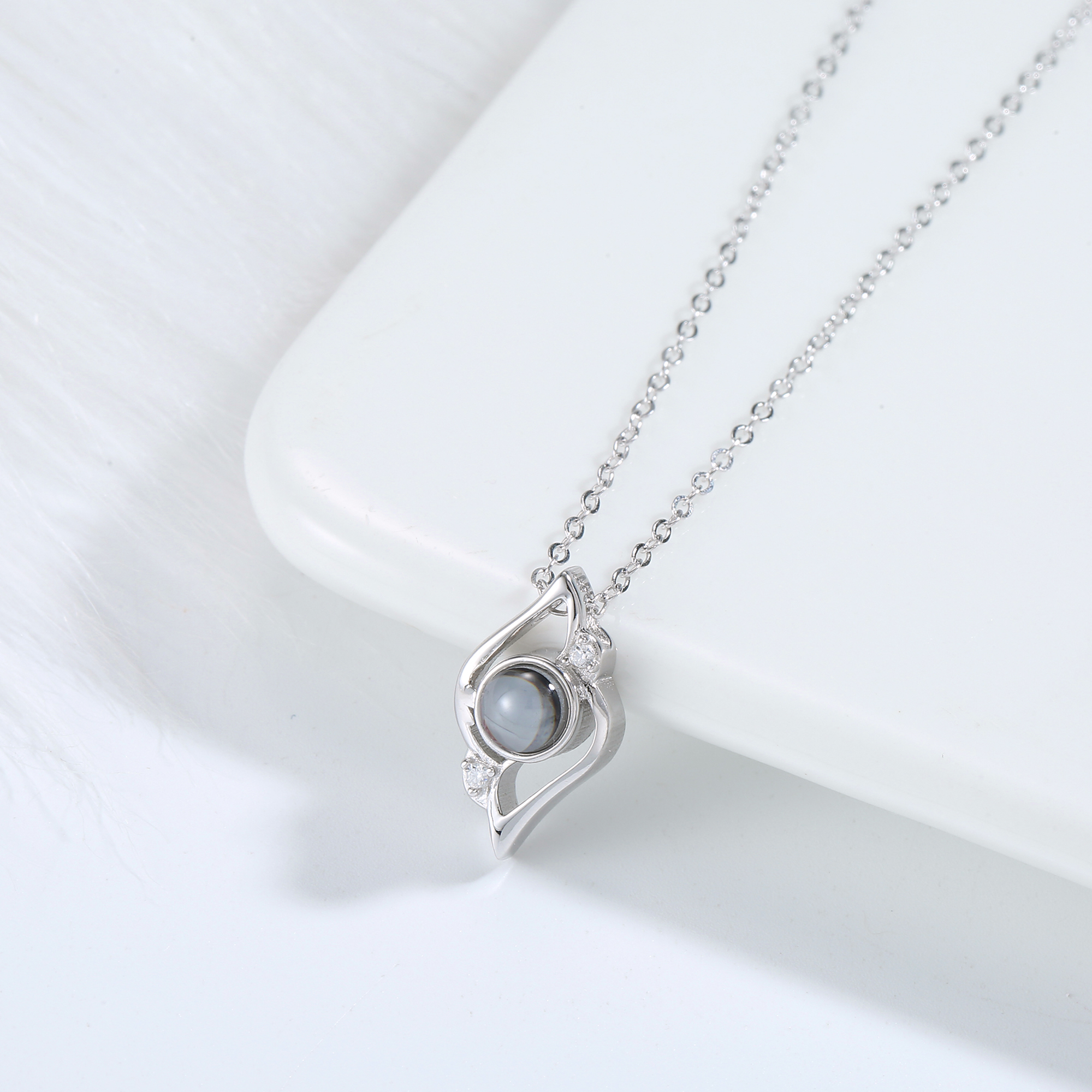 MemoryShell silver necklace featuring protective oval smoky quartz pendant