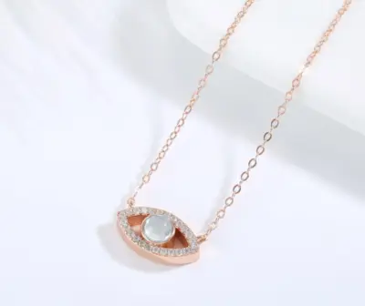 QRystal SoulGate rose gold necklace featuring smoky quartz eye pendant