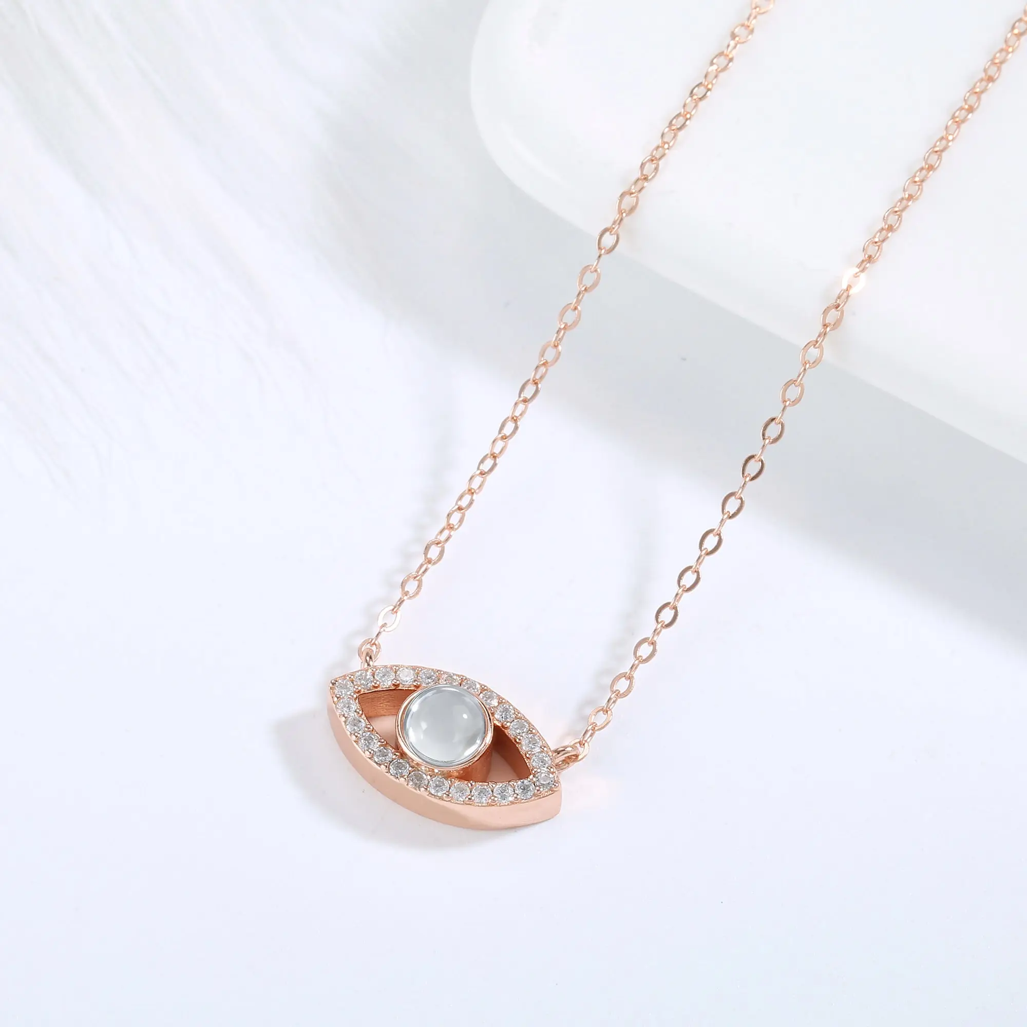 QRystal SoulGate rose gold necklace featuring smoky quartz eye pendant