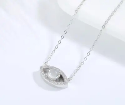 QRystal SoulGate silver necklace featuring smoky quartz eye pendant
