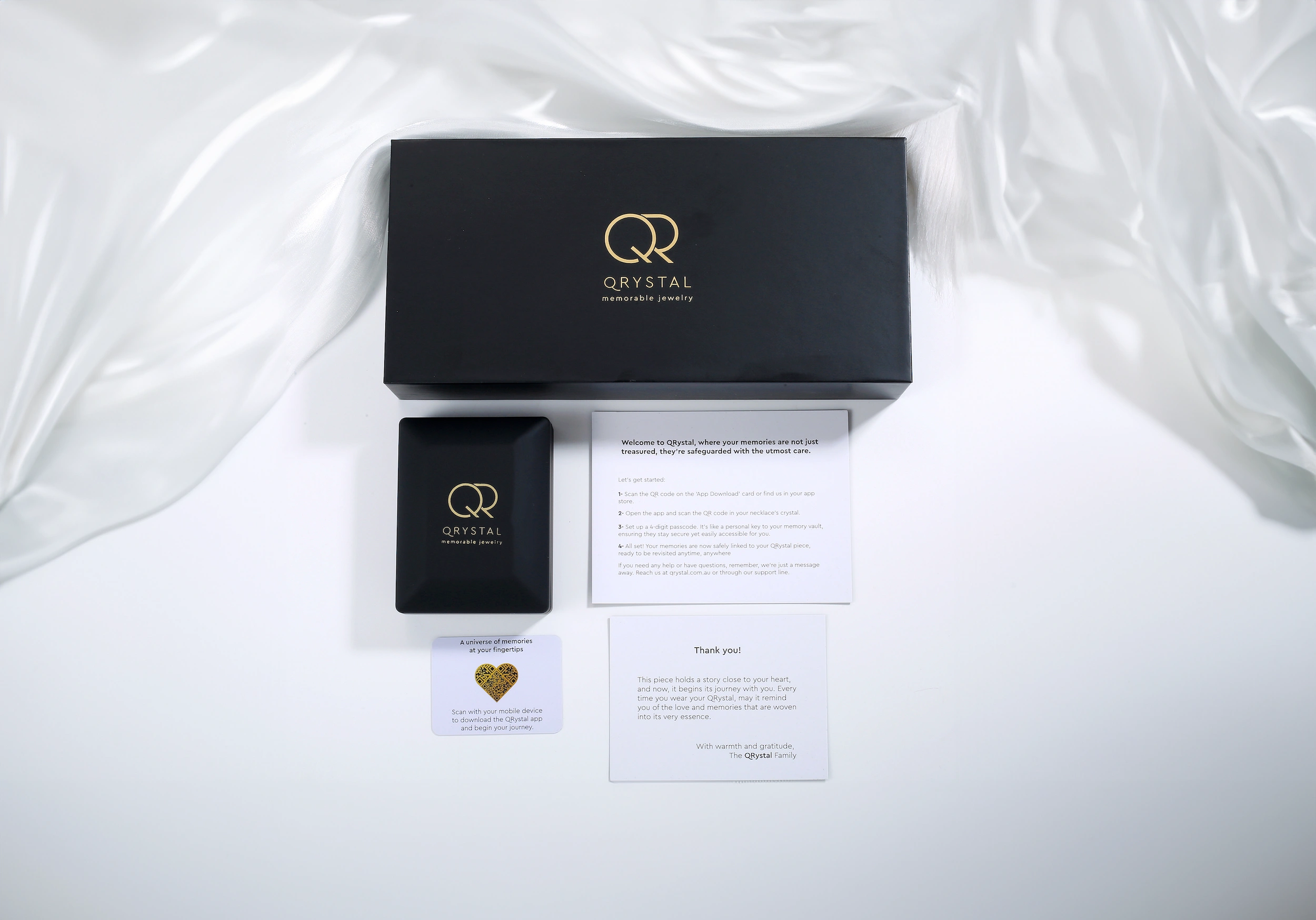 QRystal complete packaging and welcome kit with integrated QR setup guide