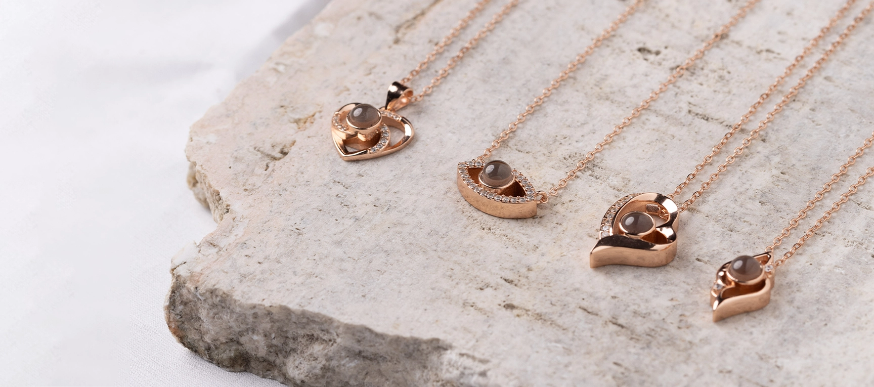 QRystal rose gold Gentle Heart, MemoryShell and SoulGate pendants with integrated QR technology